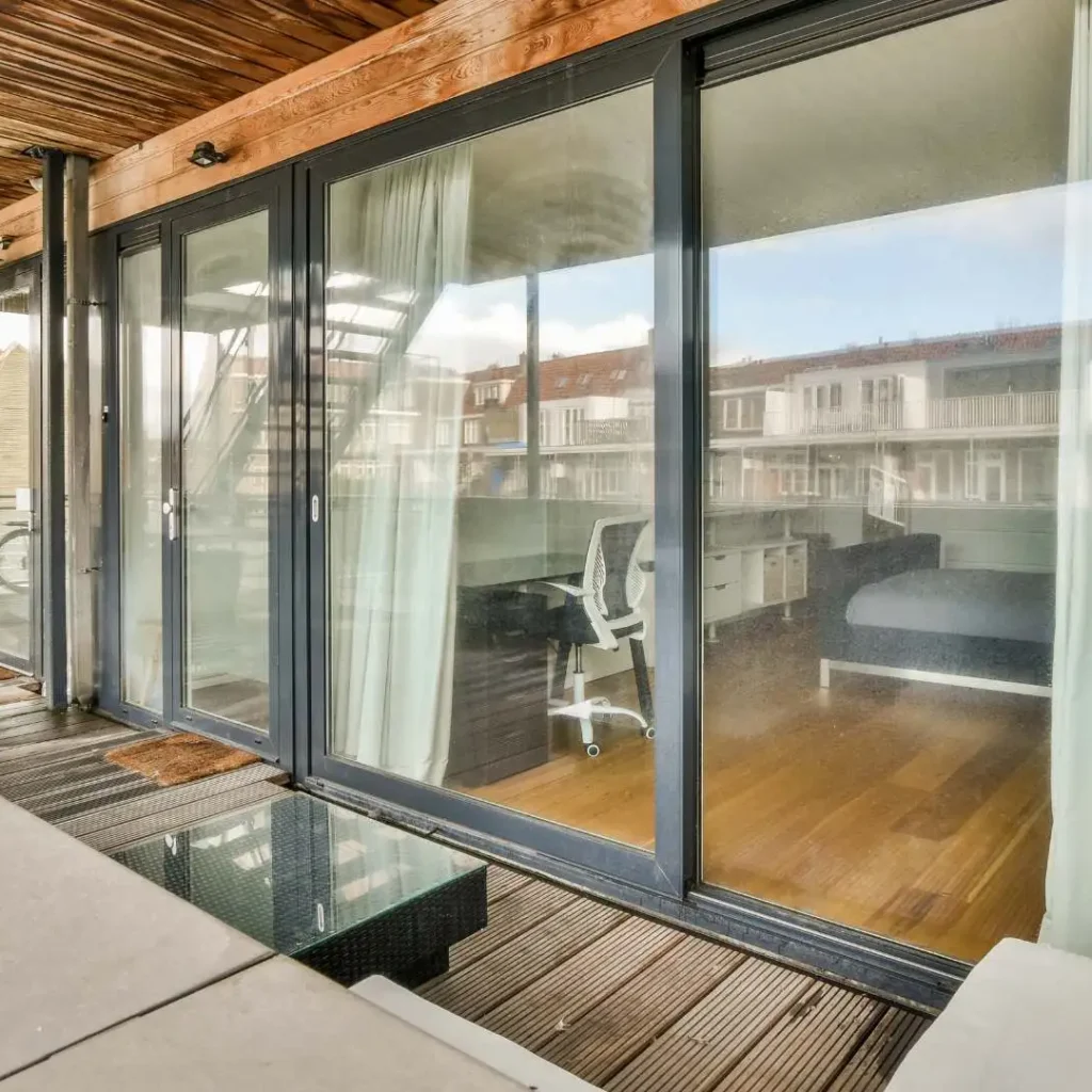 Staircase glass railing with minimal posts